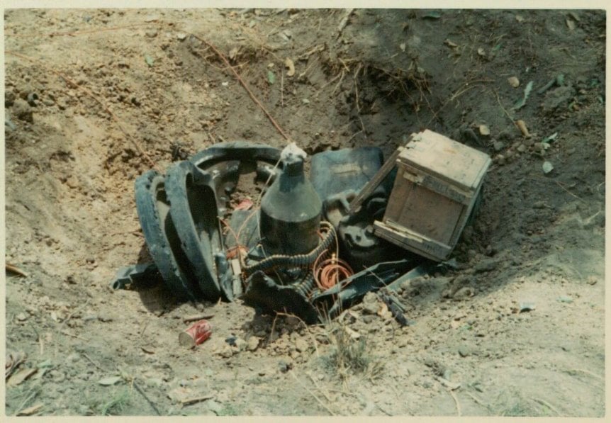Equipment in a dirt hole.