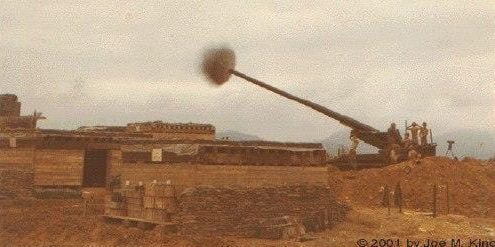 A cannon firing off a shot.