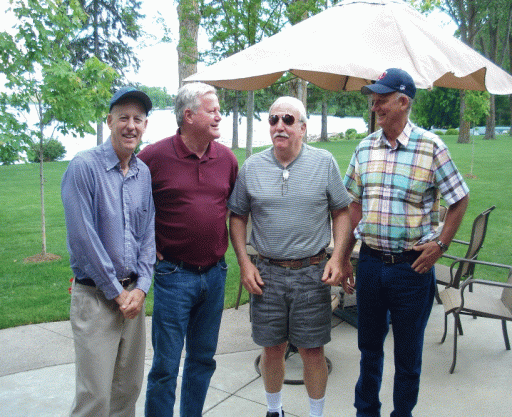 Modern-day photo of four older vets, reunited.