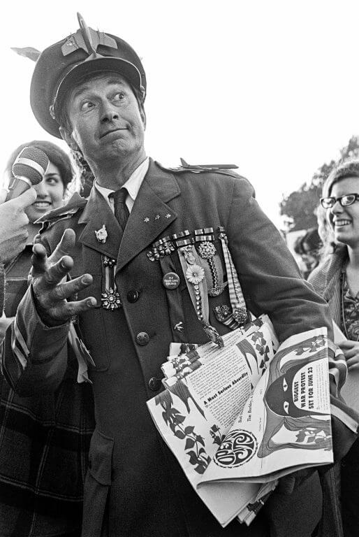 General Hersheybar with a handful of spoof newspapers.
