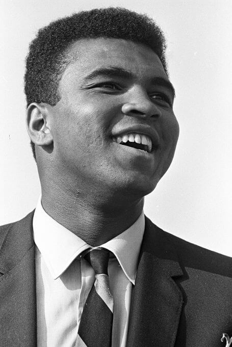 Muhammad Ali smiling out onto the crowd.