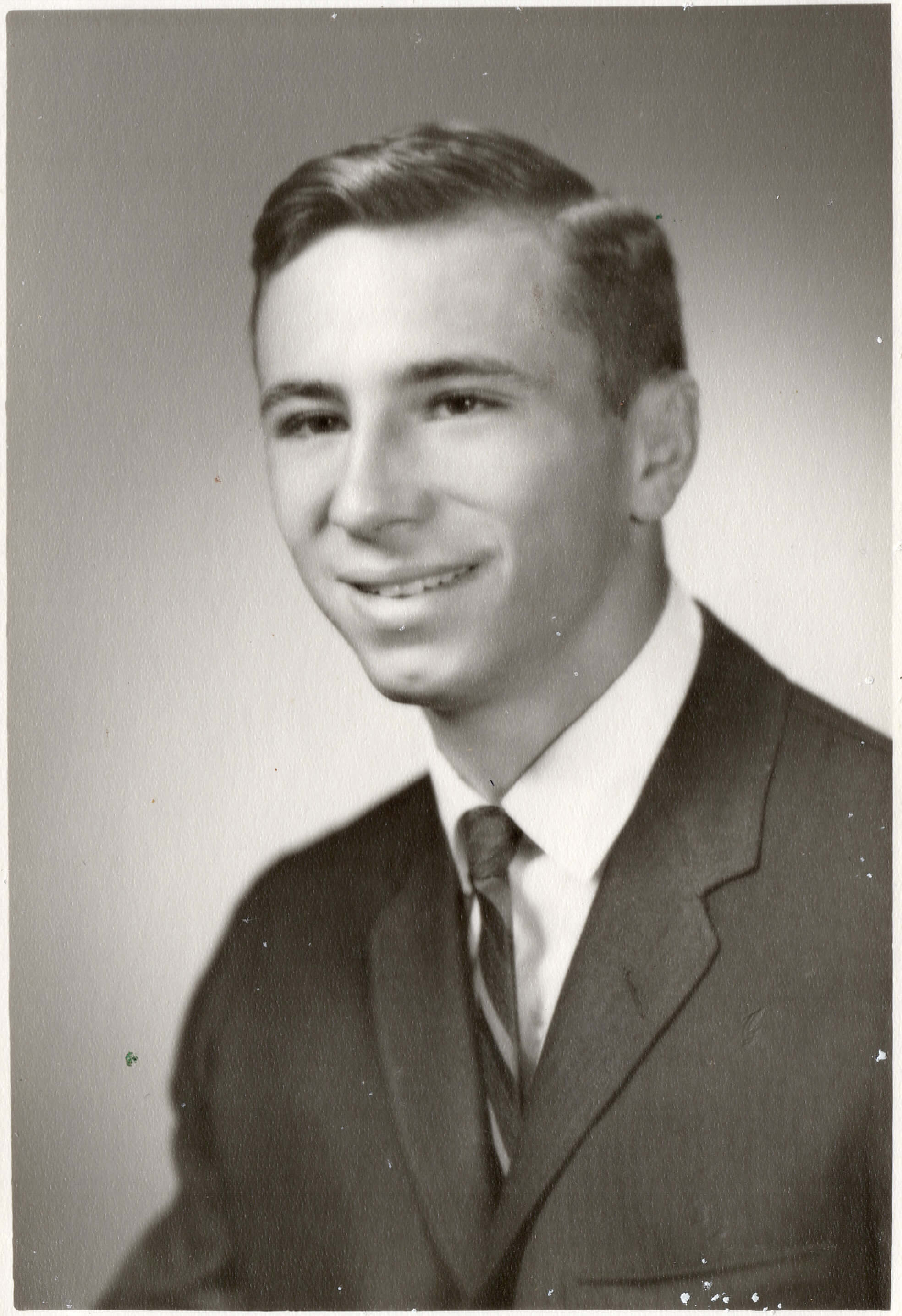 School portrait of a young man in a suit coat and tie.