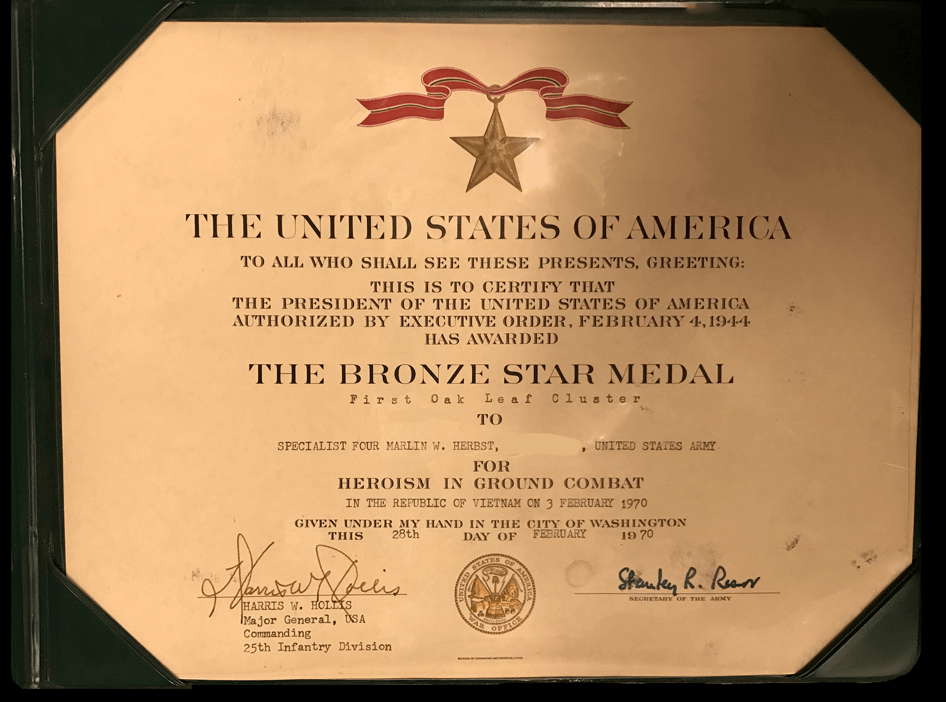 Certificate for a Bronze Star Medal, presented to Marlin Herbst on 2-28-1970.