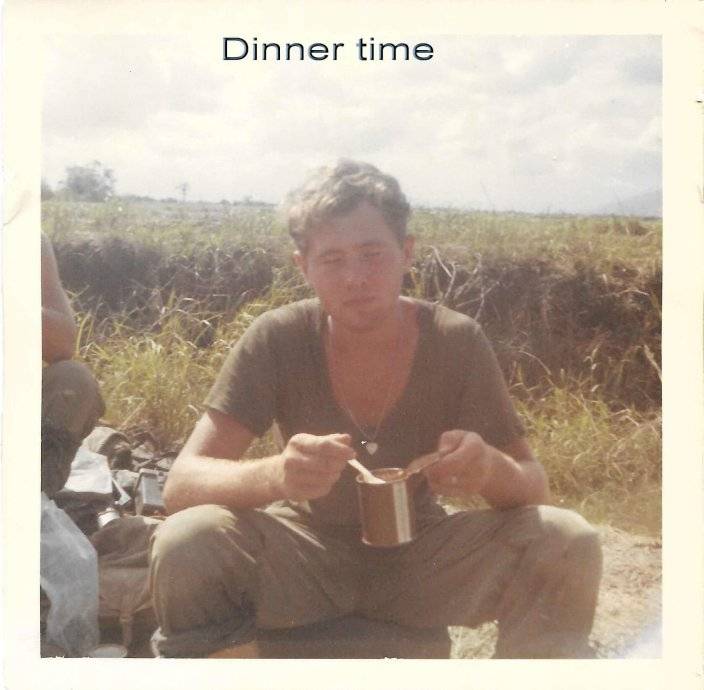 A soldier eating from a can. Text says: "Dinner time"