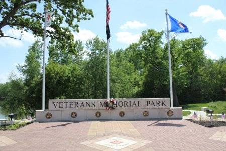 Veterans Memorial Park Sign and flags