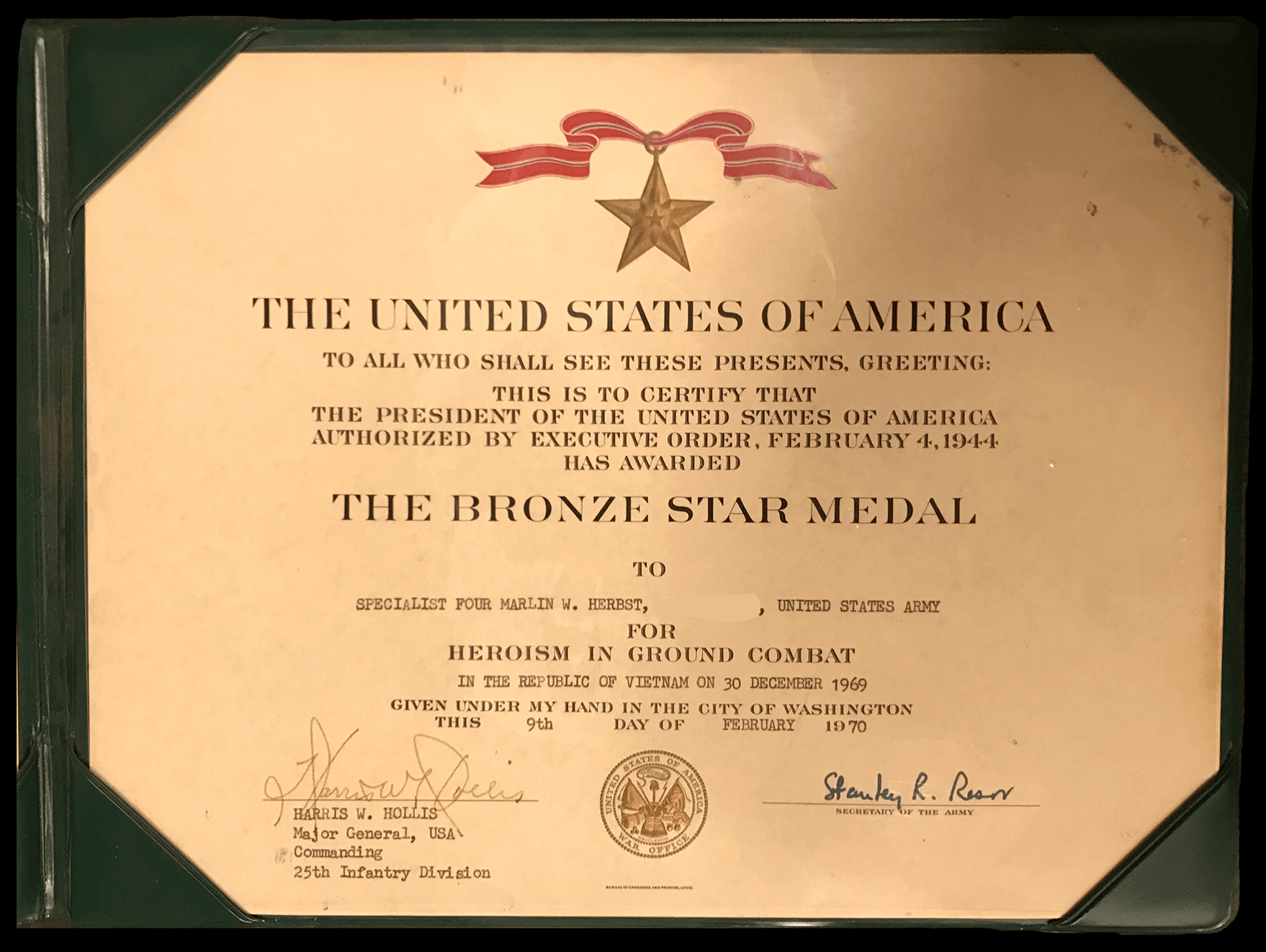 Certificate for a Bronze Star Medal, presented to Marlin Herbst on 2-9-1970.