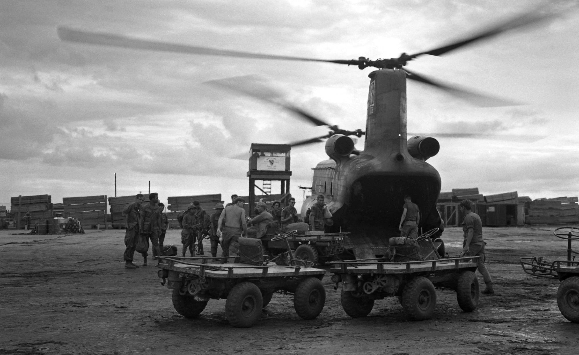 Soldiers loading a helicopter in Vietnam.