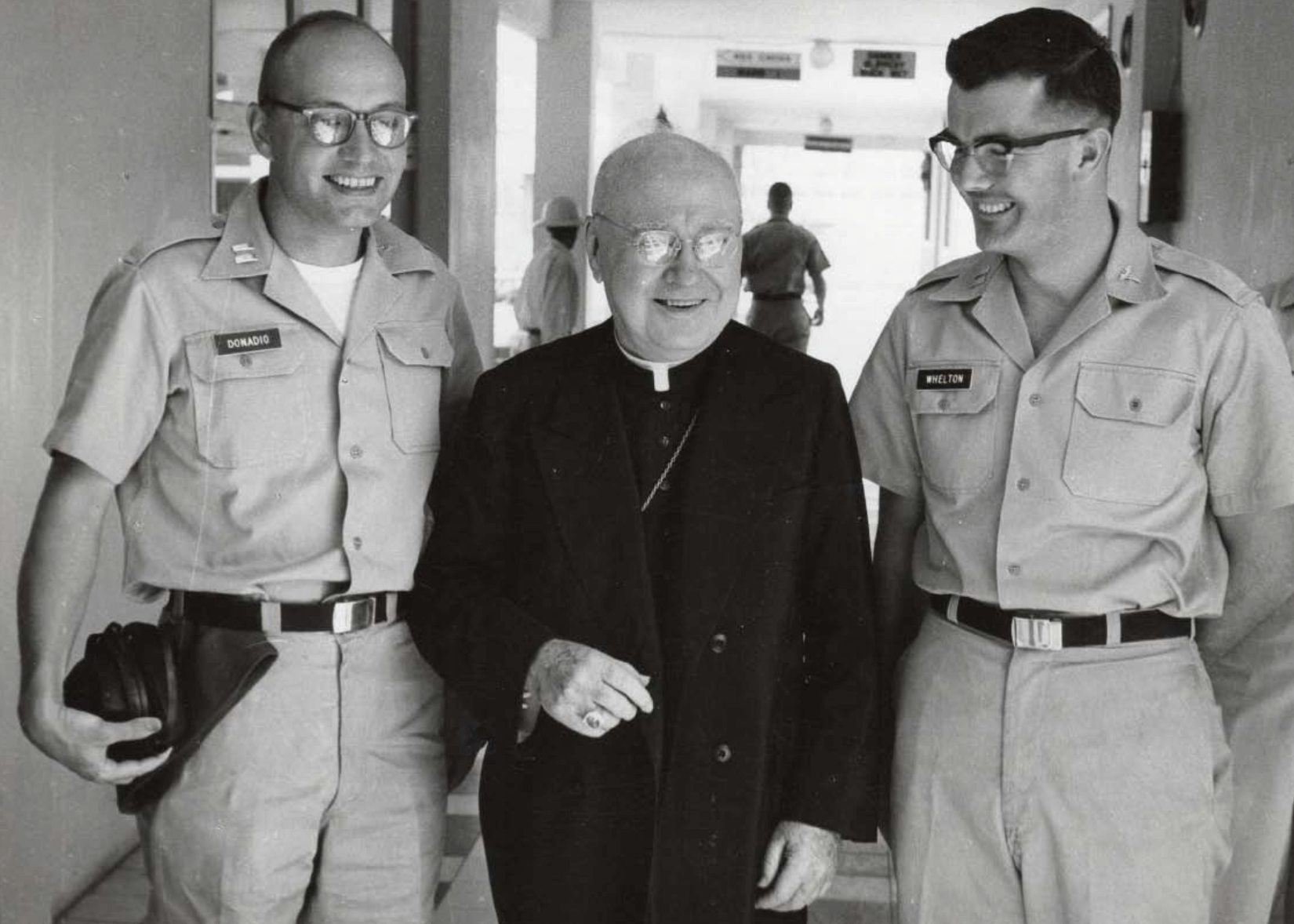 Black and white photo of Drs. Donadio and Whelton in uniform with Cardinal Spellman