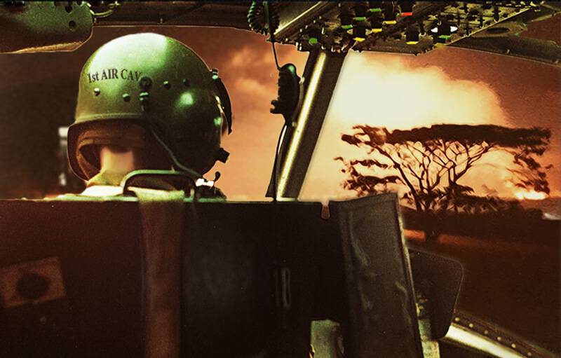 A photoshopped image of a pilot with a "1st Air Cav" helmet on.