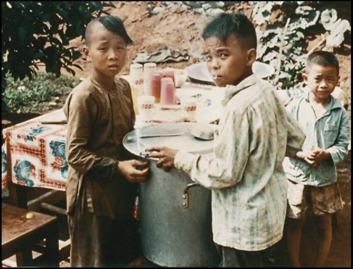 Young Asian boys smoking cigarettes.