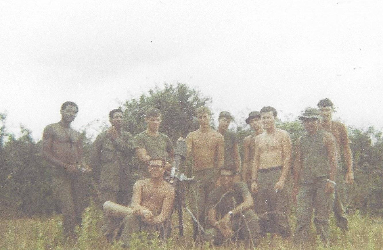 Posed but casual photo of a group of U.S. soldiers.