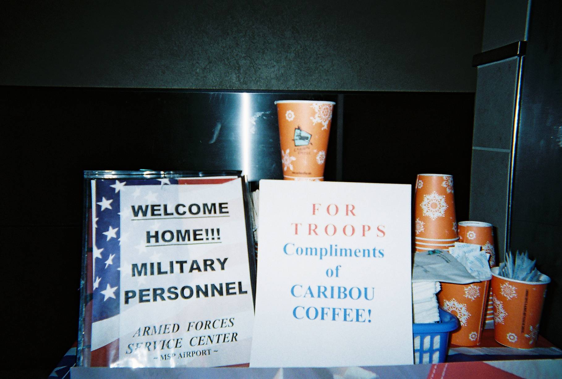 Welcome Home! Signage and Caribou Coffee complimentary drinks.