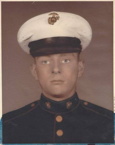 An official Marine portrait of a young man.