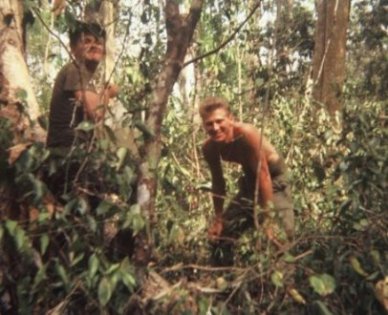 Two U.S. soldiers in the jungle.