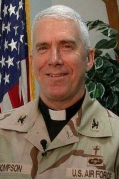 A contemporary portrait of an Air Force chaplain, clergy shirt under his fatigues.