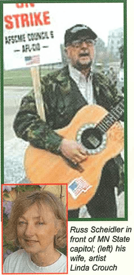 Newspaper or magazine clipping of an older man with a guitar, wearing a camo jacket and holding a picket sign. Caption says "Russ Schediler in front of MN State capitol; (left) his wife, artist Linda Crouch."