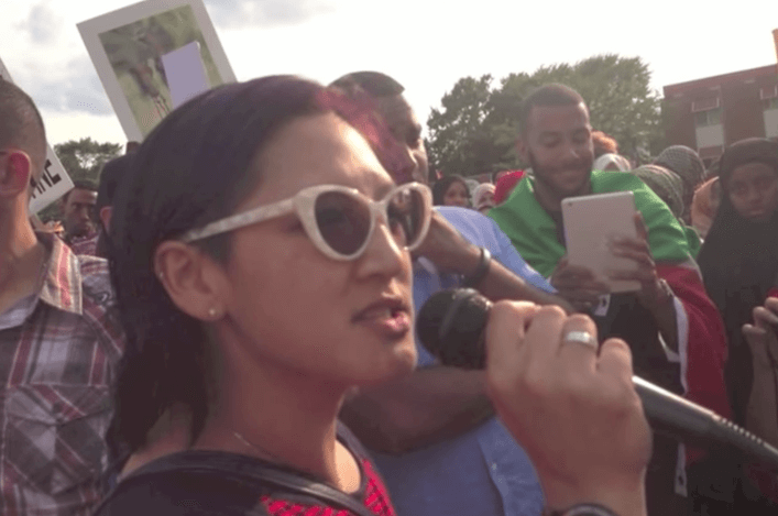 Anh Pham at a protest.