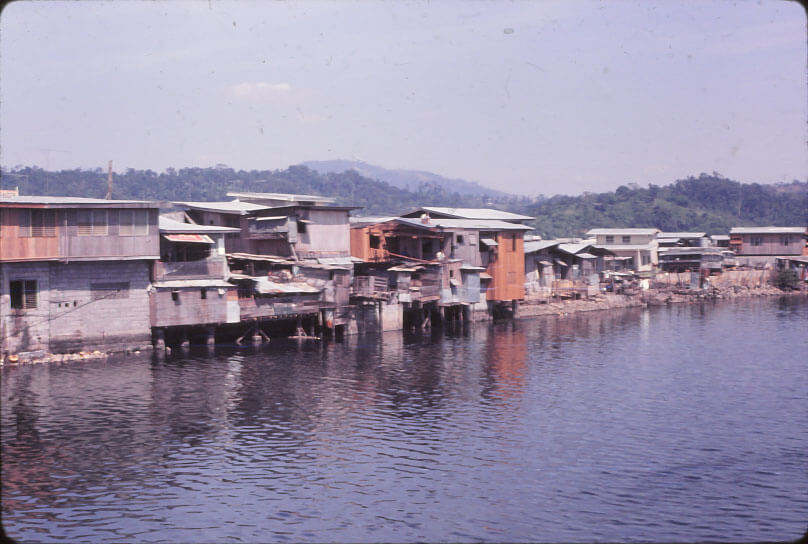 Buildings and/or houses on a body of water.