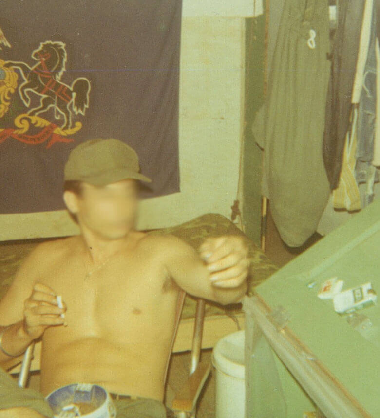 Blurry photo of a young Vietnam soldier using heroin.