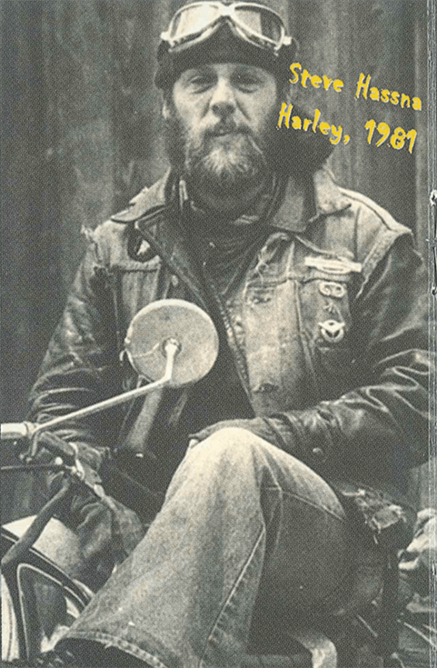 Photo of a middle-aged man on a motorcycle. Text on photo says "Steve Hassna, Harley 1981".
