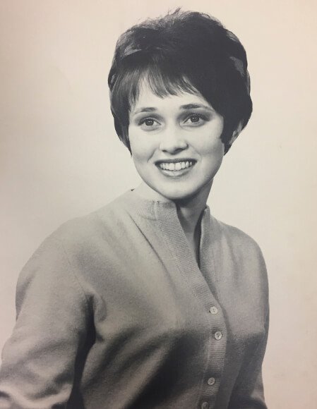 Black and white yearbook photo of a young woman.