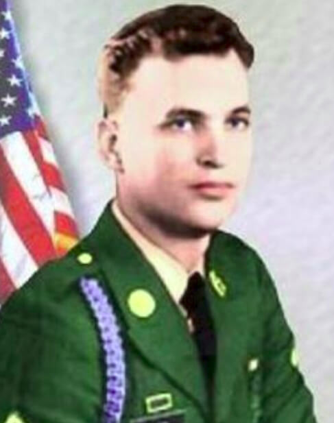 Soldier in a green military uniform.