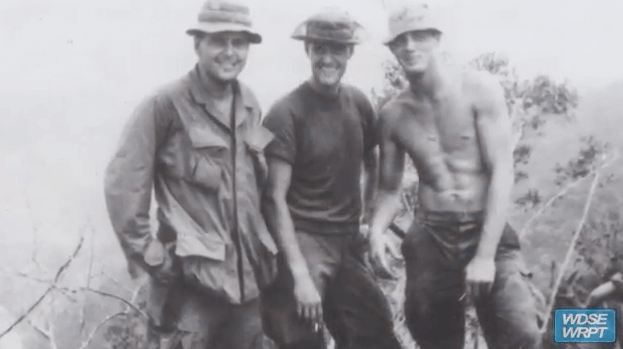Black and white photo of three soldiers in Vietnam.