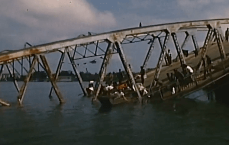 Damaged bridge over water in Vietnam