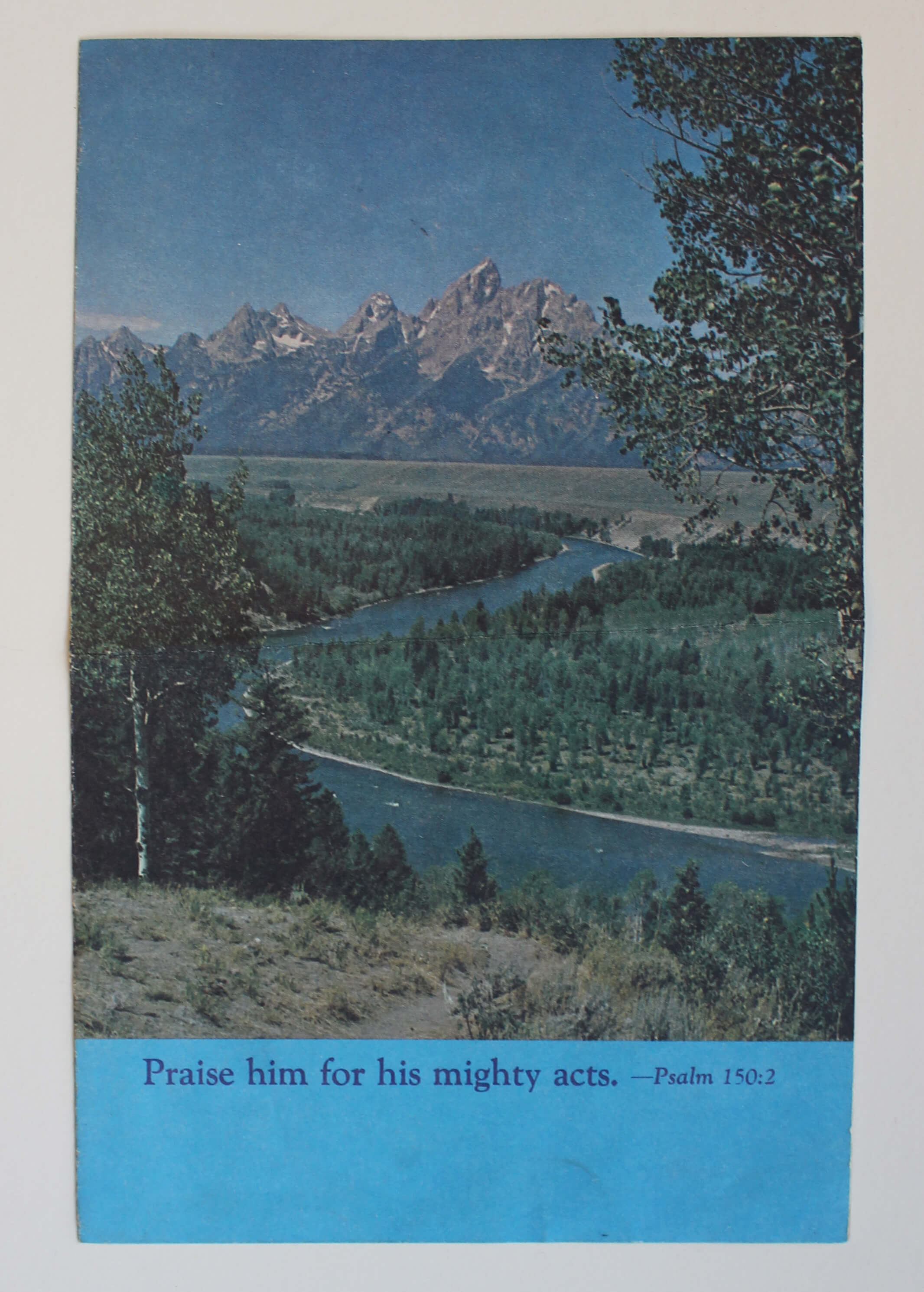 Cover of a memorial service program with text reading Praise him for his mighty acts. - Psalm 150:2
