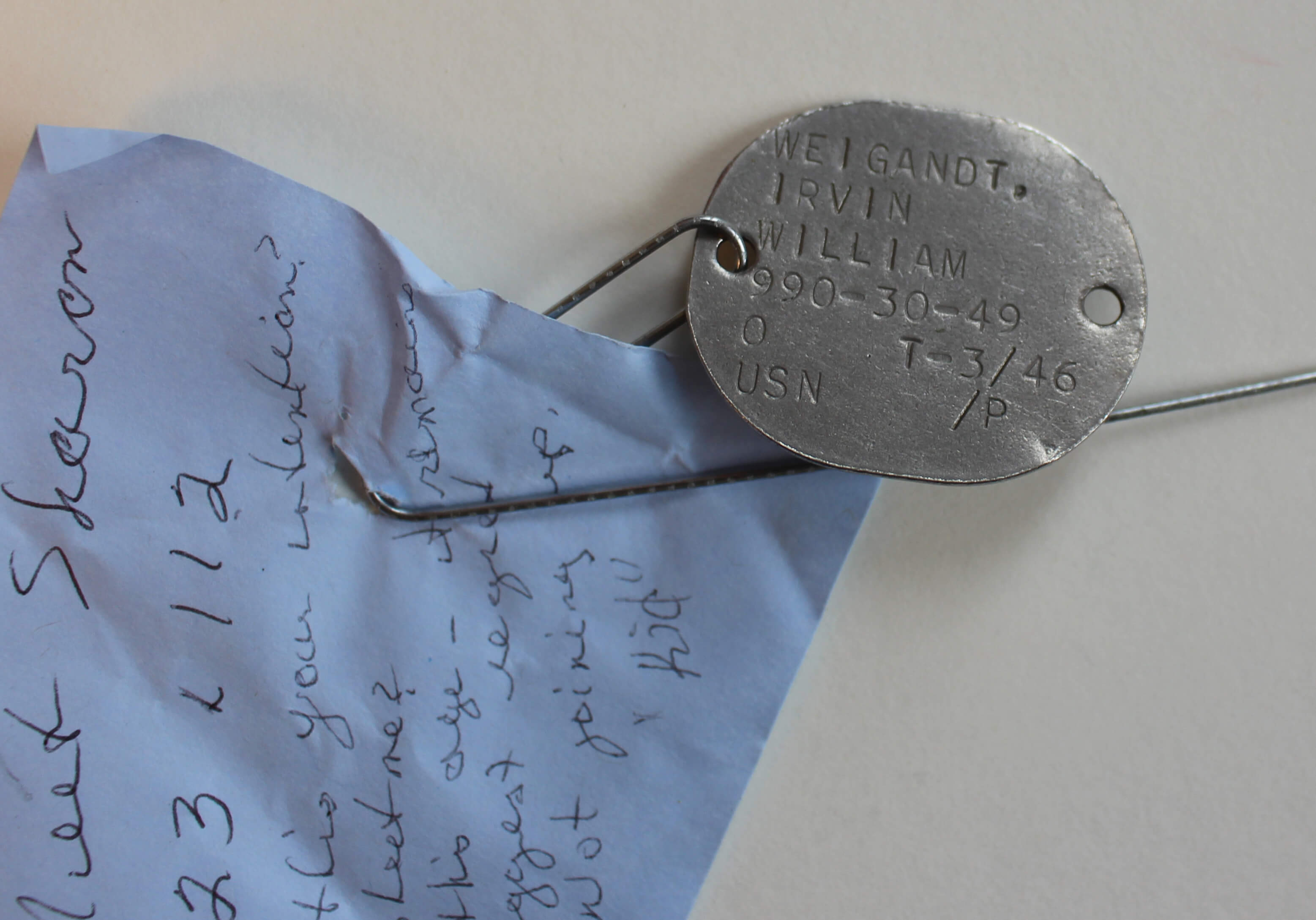 Note and dog tag for Dad, from "kid"