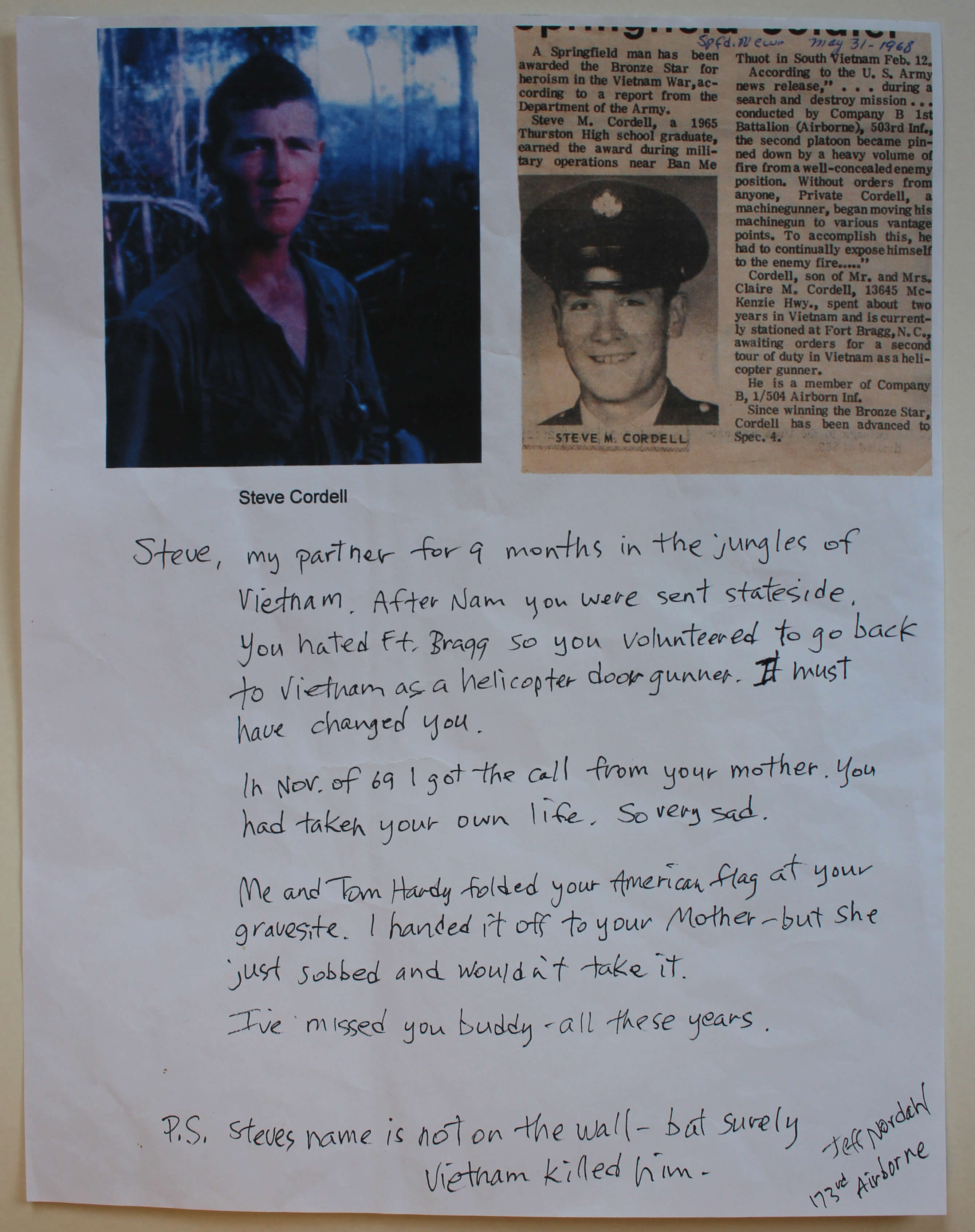 Photos and letter left at The Wall That Heals