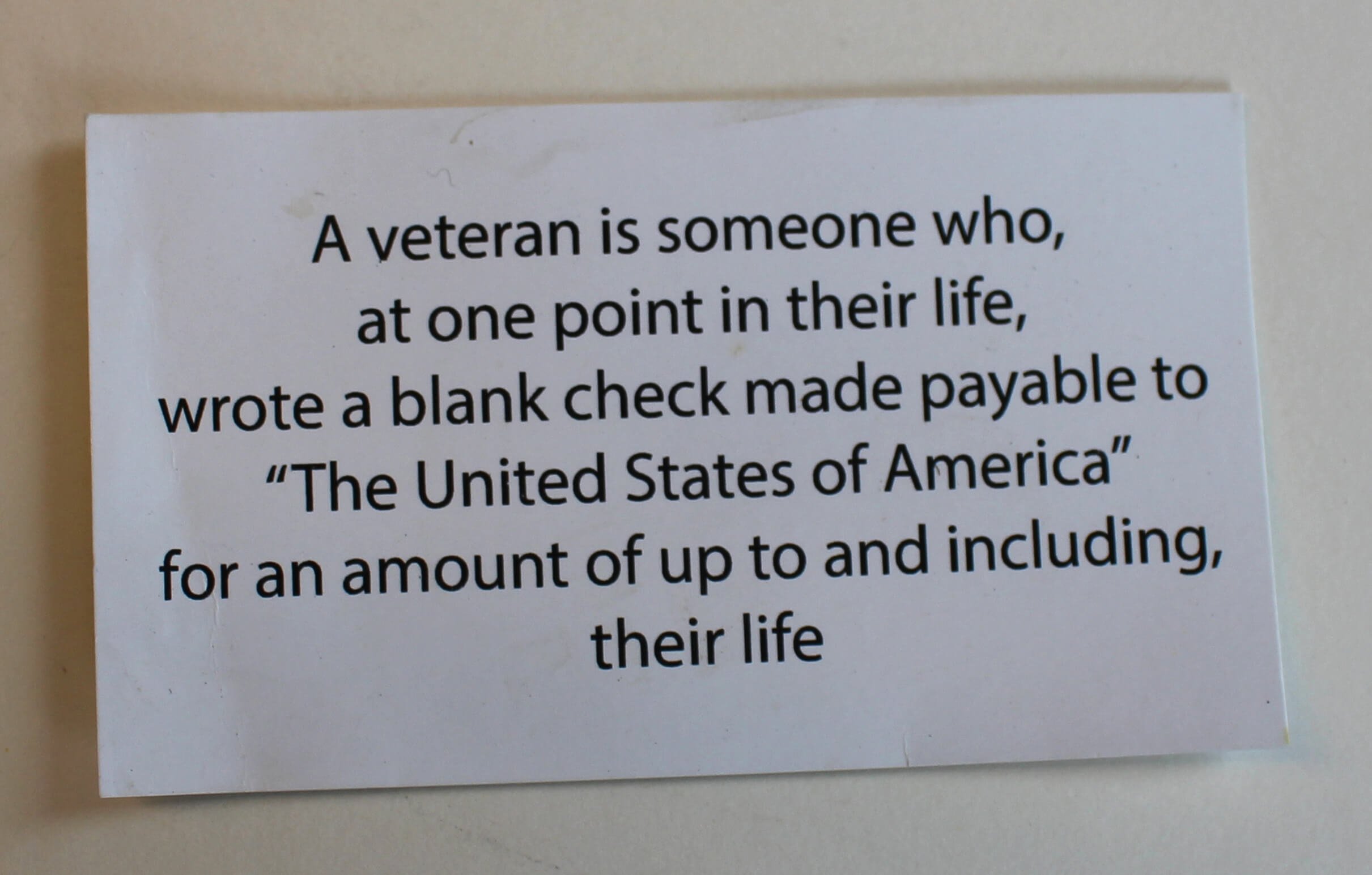 Quote saying "A veteran is someone who, at one point in their life, wrote a blank check made payable to 'The United States of America' for an amount of up to and including, their life"