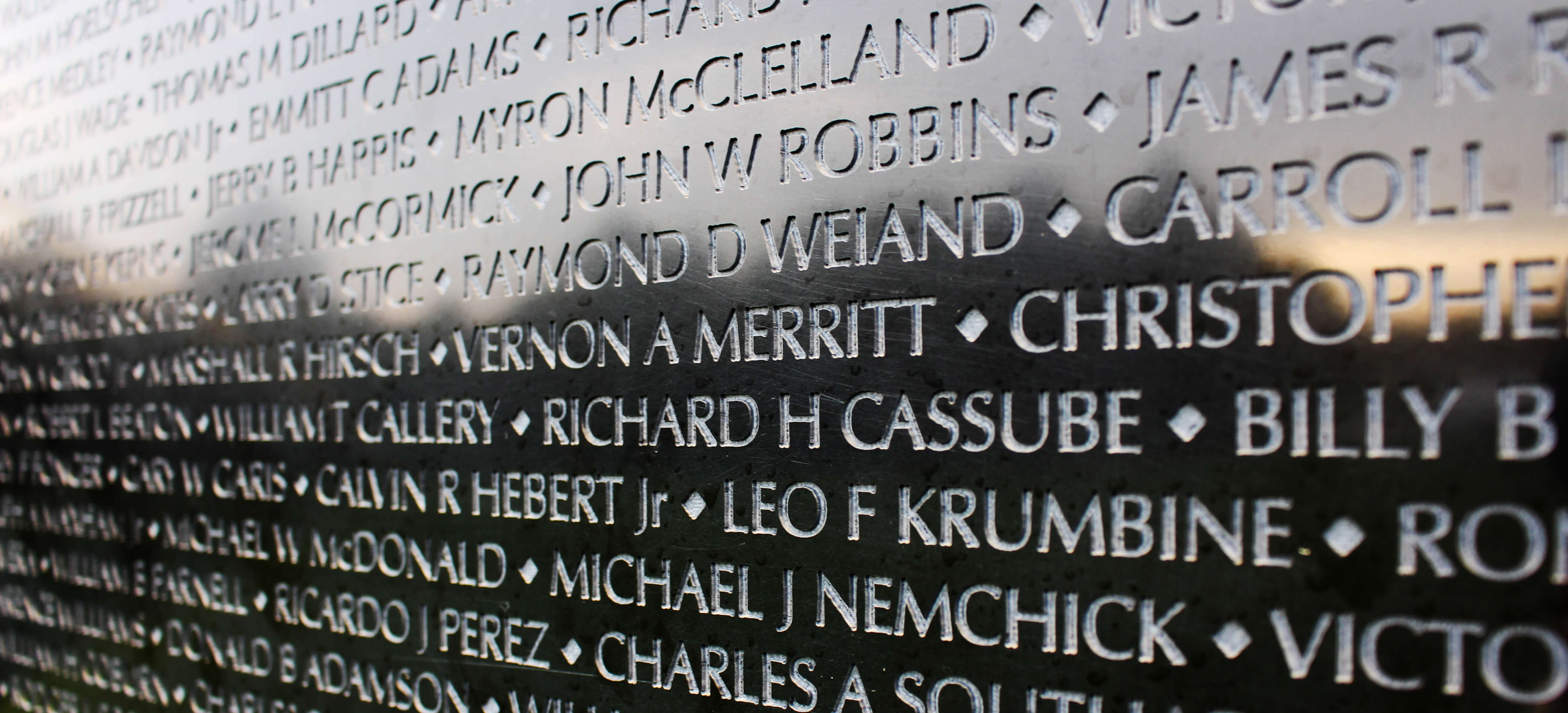 Names engraved on a memorial wall.