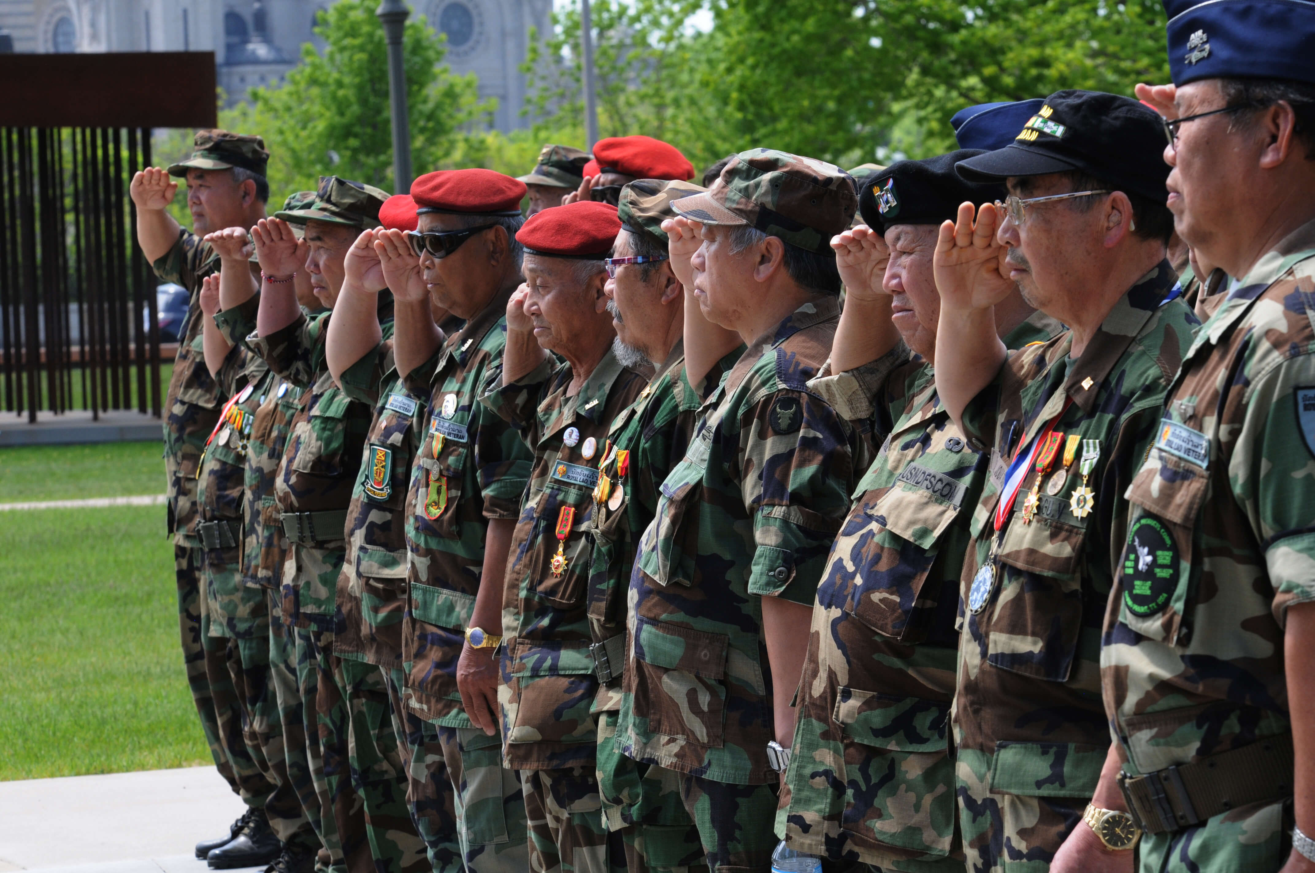 Group of SGU veterans saluting