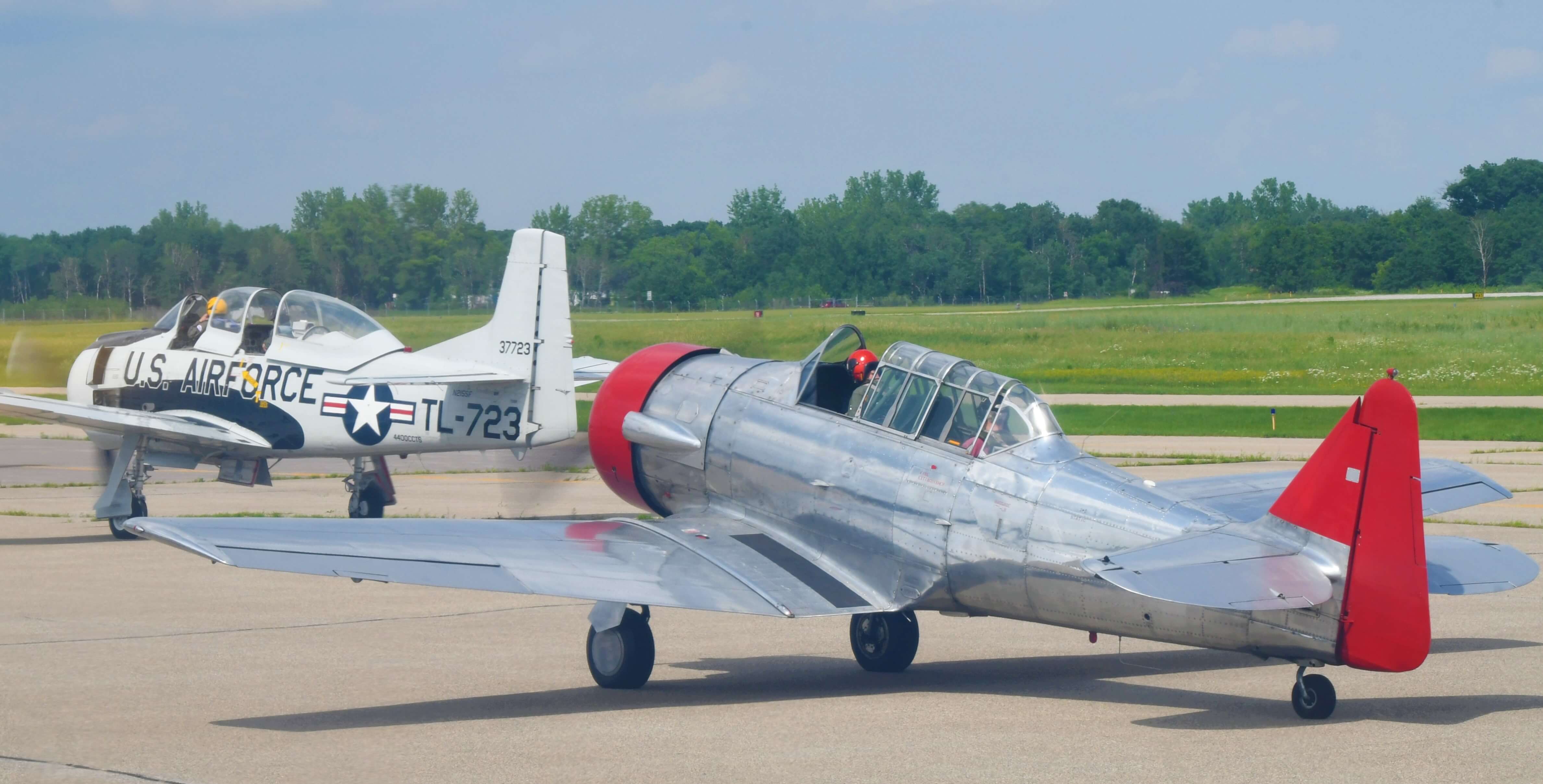 Vintage aircraft preparing for the State Capitol Flyover at Anoka Airport