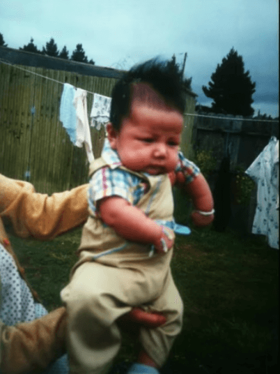 Baby boy in overalls