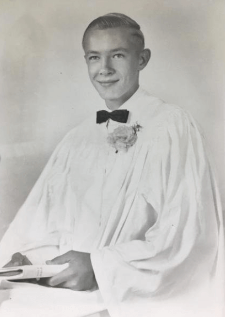 Portrait of a young boy in church attire