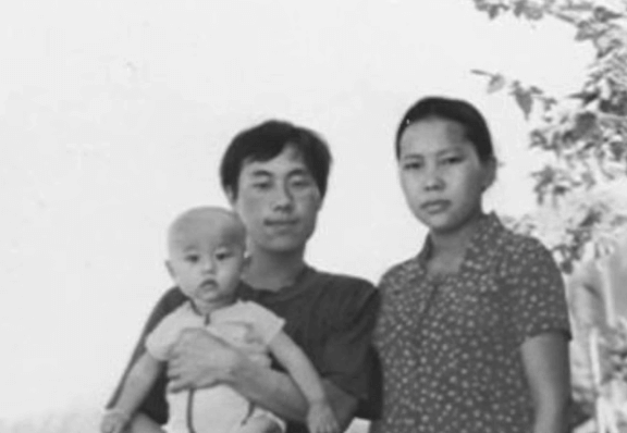 Hmong man, woman and child