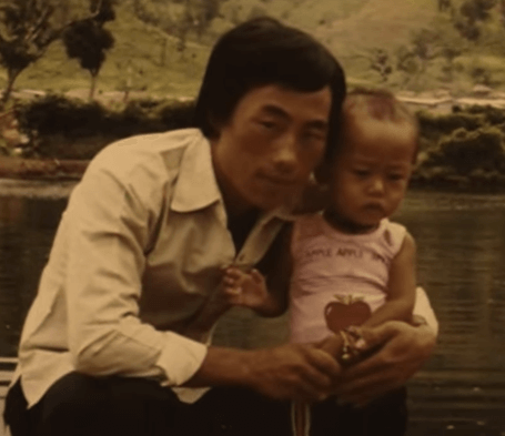 Hmong man and child