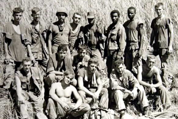 Group of Marines pose for a photo