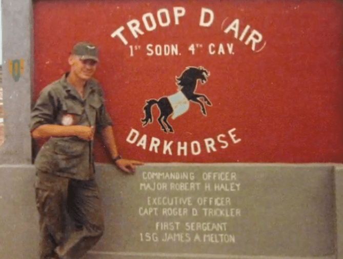 Soldier with a Troop Do sign