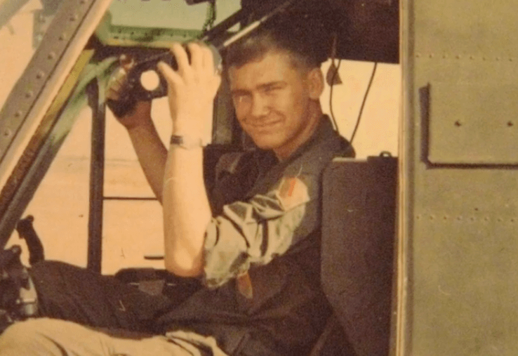 Vietnam soldier in a helicopter