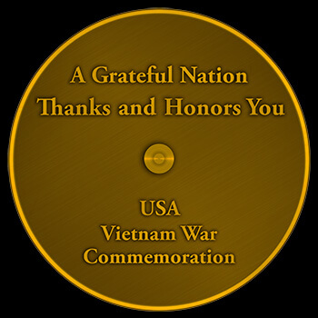 The back of the Vietnam Veteran lapel pin that says A grateful nation thanks and honors you