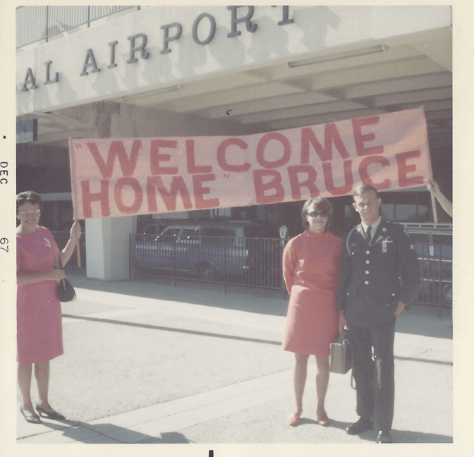 Man being welcomed home after Vietnam by wife